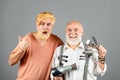 Barber with scissors and razor, barbershop. Beard man, bearded male. Portrait beard man. Barber making haircut of