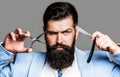 Barber scissors and straight razor, barber shop. Beard man, bearded male. Portrait beard man. Barber scissors and Royalty Free Stock Photo