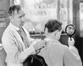 Barber shaving off too much hair Royalty Free Stock Photo