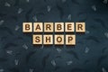 Barber Shop background. Many mustache and hairdresser scissors and comb icons. Dark background