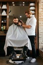 Barber Shop. Man Getting Haircut In Hair Salon Royalty Free Stock Photo