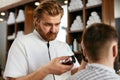 Barber Shop Men Hair Cut. Barber Doing Men Fashion Hairstyle Royalty Free Stock Photo