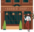 Barber shop open, street building brown facade of retro barbershop with man barber