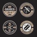 Barber shop set of four vector colored vintage round badges, emblems, labels or logos on dark background Royalty Free Stock Photo