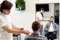 Barber talking to caucasian man while sitting in chair