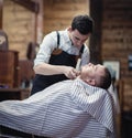 Shaving beard trimmer at the hairdresser