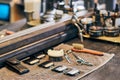 Barbershop haircut tools barber equipment on wooden countertop front of mirror, old vintage interior Royalty Free Stock Photo