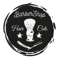 Barbershop lazor blade, shaving brush, stamp style, black and white cirle with text hair cuts Royalty Free Stock Photo