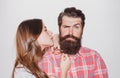 Barbershop procedures. Hairdresser concept. Woman hairdresser cuts beard with scissors. Man with long beard, mustache Royalty Free Stock Photo