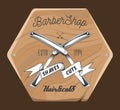 Barbershop salon wooden signboard with inscriptions, crossed razors and tape with lettering