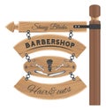 Barbershop salon wooden signboard with inscriptions, shaving brush, clippers and dangerous blade Royalty Free Stock Photo