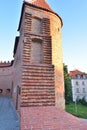 The Barbican Tower in the Warsaw Old Town in the light of the rising sun