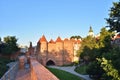 The Barbican Tower in the Warsaw Old Town in the light of the rising sun