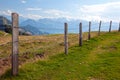 Barbwire fence in the Swiss countryside Royalty Free Stock Photo