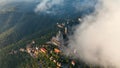 Aerial view of Barcelona Tibidabo above the clouds and fog, Catalonia, Spain