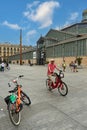 Barcelona - August 31, 2023: Man on rental electric bicycle available to citizens in Barcelona