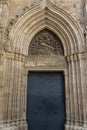 Facade of a Medieval church in the Carrer dels Comtes street in the Gothic Quarter of Barcelona, Spain