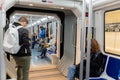 People in Metro of Barcleona without tourists in times of the Covid in 2021