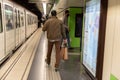 People in Metro of Barcleona without tourists in times of the Covid in 2021