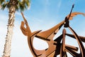 Artwork at the beach of Barceloneta Sculpture tribute to swimming art.