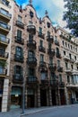 Barcelona, Catalonia, Spain, September 22, 2019. Details of the exterior historical buildings. Ancient bas-reliefs on the windows Royalty Free Stock Photo