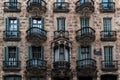 Barcelona, Catalonia, Spain, September 22, 2019. Details of the exterior historical buildings. Ancient bas-reliefs on the windows