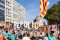 People holding `Republica` word and banners claiming the freedom for some exiled and prisoner Catalan politicians. Independentist