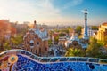 Barcelona city view from Guell Park. Sunrise view of colorful mosaic building in Park Guell