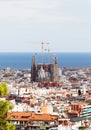 Barcelona city view with Sagrada FamÃÂ­lia cathedral and Mediterranean Sea.