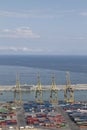Barcelona industrial harbor with cranes and containers