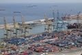 Barcelona industrial harbor with cranes and freight containers