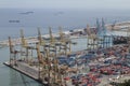 Barcelona industrial harbour with cranes and containers