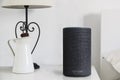 BARCELONA - JANUARY 2019: Amazon Alexa Smart speaker on a book on a bedroom table