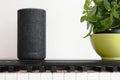 BARCELONA - JUNE 2018: Amazon Echo Smart Home Alexa Voice Service on a piano in a living room on June 20, 2018 in Barcelona. Royalty Free Stock Photo