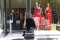 BARCELONA - JUNE 10 : Customer woman in shopping street, looking