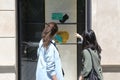 BARCELONA - JUNE 10 : Customer woman in shopping street, looking