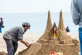 Sand sculptor working at La Barceloneta Beach in Barcelona Spain Royalty Free Stock Photo