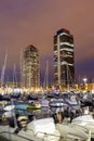 Barcelona Marina yacht harbor Port Olimpic city town at twilight portrait format in Spain Royalty Free Stock Photo