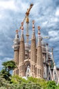 BARCELONA - MAY 14, 2018: Sagrada Famila facade on a cloudy day.