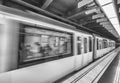 BARCELONA - MAY 2018: Subway train moving fast in the underground station. Going by subway is the best way to move in the city Royalty Free Stock Photo