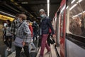 Barcelona metro, the train arrives at the Barceloneta station and people get off the car