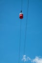 Barcelona red cable car on a blue sky background Royalty Free Stock Photo