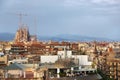 Barcelona roofs against background of Sagrada Familia