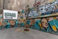 Barcelona\'s Gracia neighborhood bursts with colorful street art, including squirrels painted with bold, bright hues