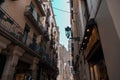 Barcelona, Spain - April 16, 2022 : Classic apartment building with balconies and shutters in Barcelona