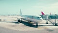 BARCELONA, SPAIN - APRIL, 15, 2017. Close-up pan shot of Qatar Airways Airbus airliner boarding at the airport