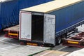 Container trailers parked in a row in a loading dock