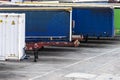 Container trailers parked in a row in a loading dock