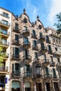 Barcelona, Spain - April 18, 2016: House facade Casa Calvet, designed by Antonio Gaudi