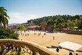 BARCELONA, SPAIN - April, 2019: View of the famous bench - serpentine seating on the main terrace of Park Guell, architectural Royalty Free Stock Photo